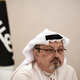 Jamal Khashoggi, looks on during a press conference in the Bahraini capital Manama, on December 15, 2014.